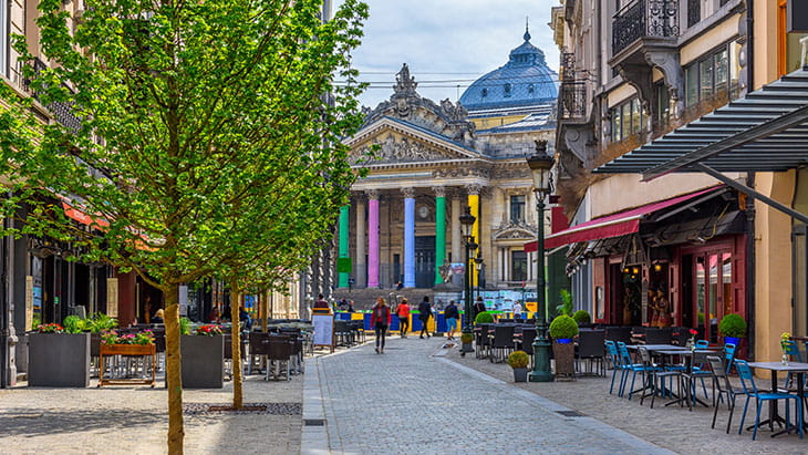 Old street with tables of cafe in center of Brussels, Belgium